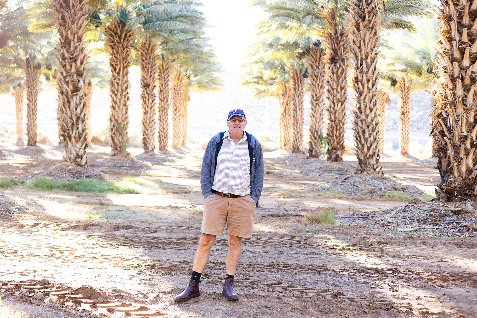 Lounic Boerdery founder standing in the orchard